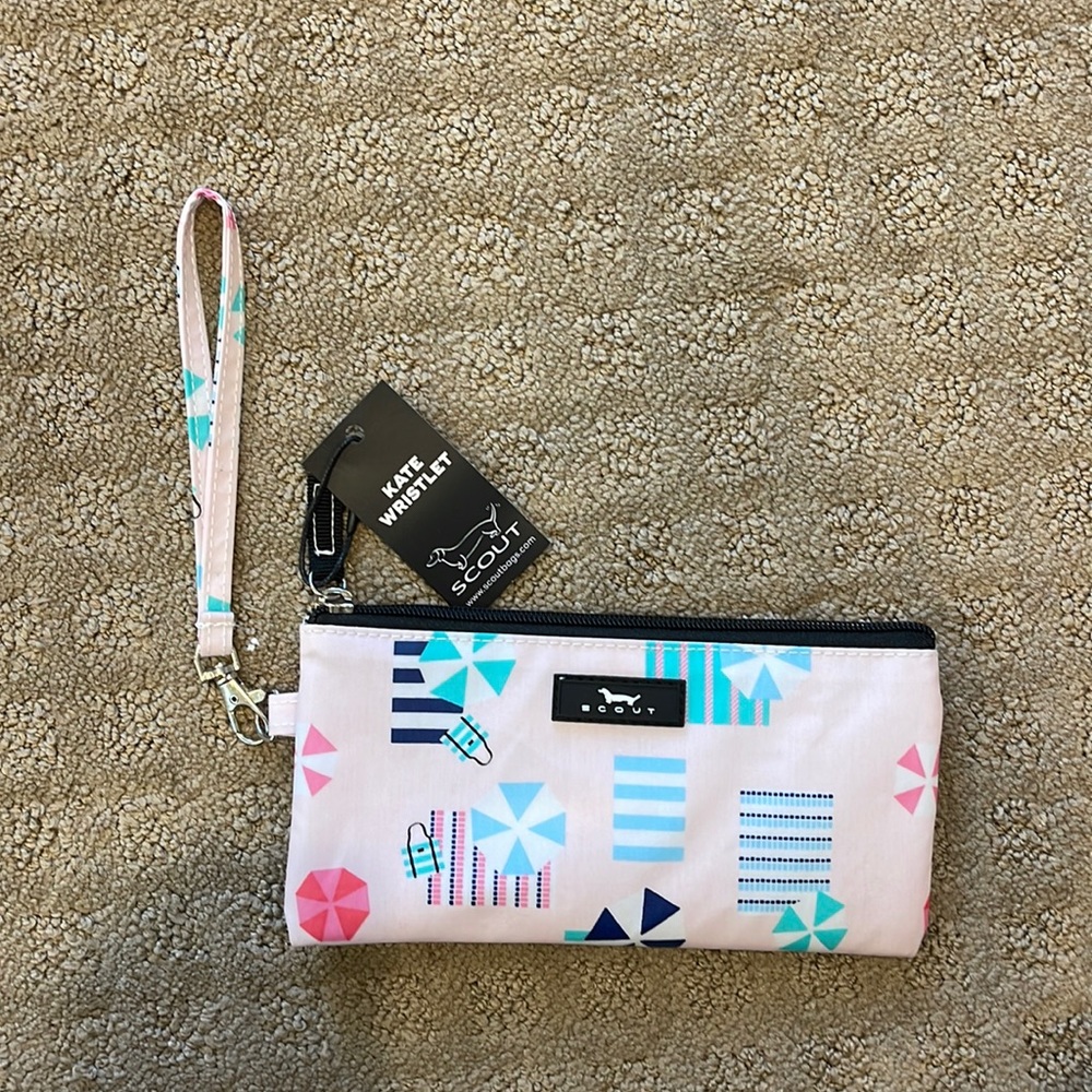 Scout wristlet in pastel pink. NWT.